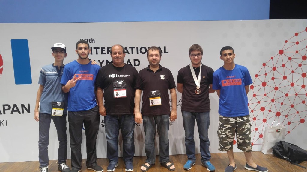 Jordan's IOI 2018 team in Japan with coaches and officials
