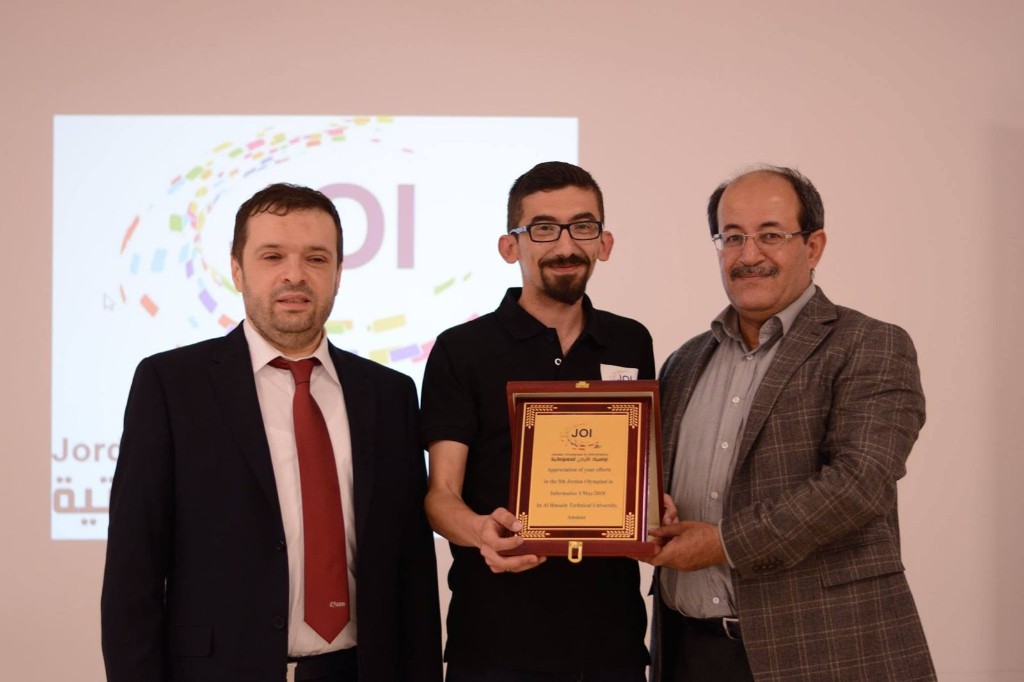 Officials presenting awards at the Jordanian Olympiad in Informatics